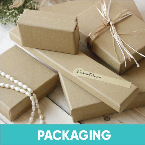 Emartbuy Gifting presents classic brown paper-wrapped gift boxes with white string and a ‘Thank You’ note, set against a rustic wooden backdrop with elegant pearl accents.