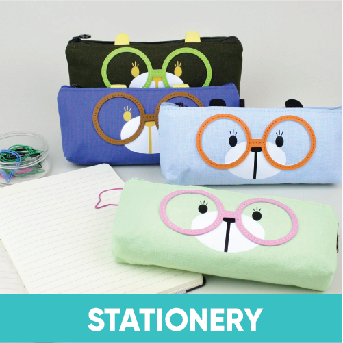 Emartbuy Gifting’s vibrant stationery collection featuring colorful pencil cases with a playful eyeglasses design, perfect for organizing your writing tools in style.