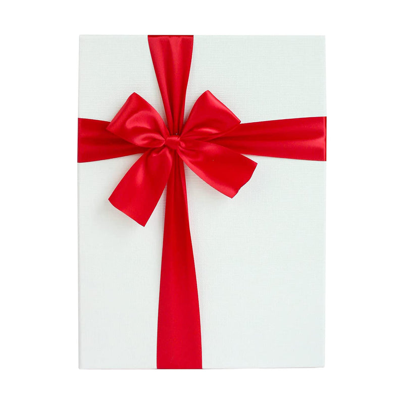 Close-up of decorative bow on red/white gift box